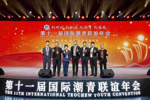 九州（中国）集团董事长罗宁弟率队赴京出席第十一届国际潮青联谊年会